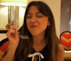Vegan YouTuber Liv B in a still from a video on best vegan food in LA and Las Vegas