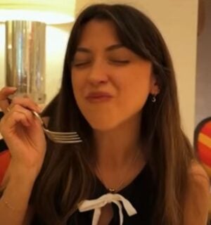 Vegan YouTuber Liv B in a still from a video on best vegan food in LA and Las Vegas