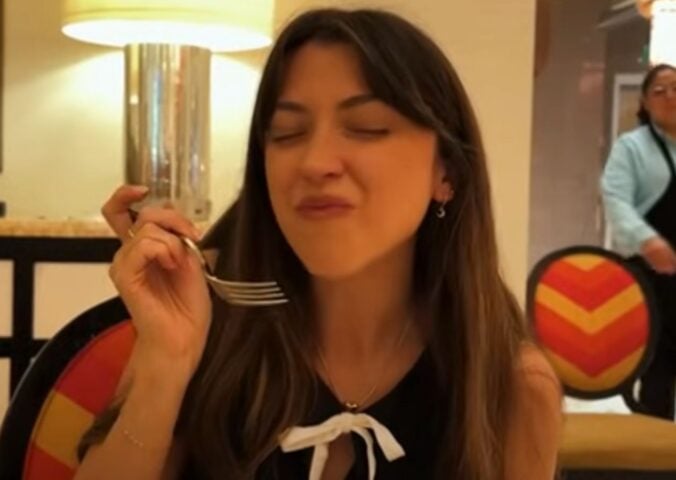 Vegan YouTuber Liv B in a still from a video on best vegan food in LA and Las Vegas