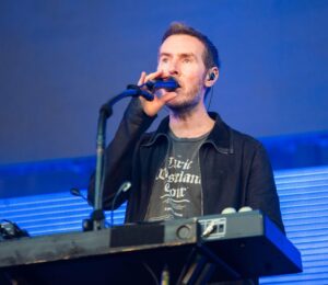 Photo shows Massive Attack singer and co-founder Robert "3D" Del Naja performing onstage