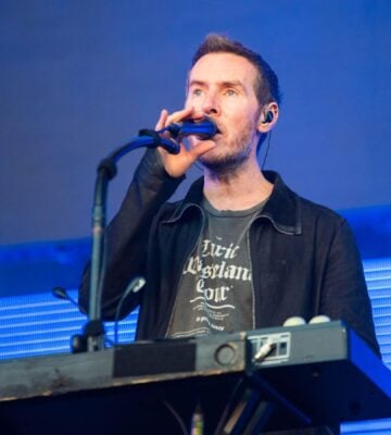 Photo shows Massive Attack singer and co-founder Robert "3D" Del Naja performing onstage