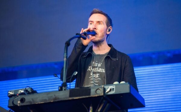 Photo shows Massive Attack singer and co-founder Robert "3D" Del Naja performing onstage