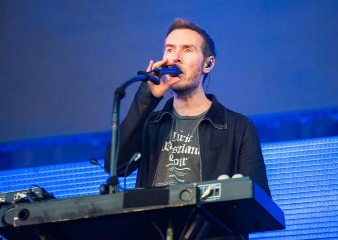 Photo shows Massive Attack singer and co-founder Robert "3D" Del Naja performing onstage