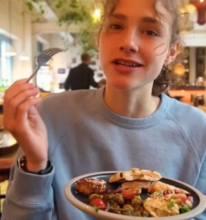 Maya Leinenbach eating vegan Syrian food on her London vegan food guide