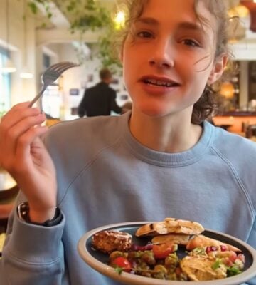 Maya Leinenbach eating vegan Syrian food on her London vegan food guide
