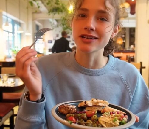 Maya Leinenbach eating vegan Syrian food on her London vegan food guide