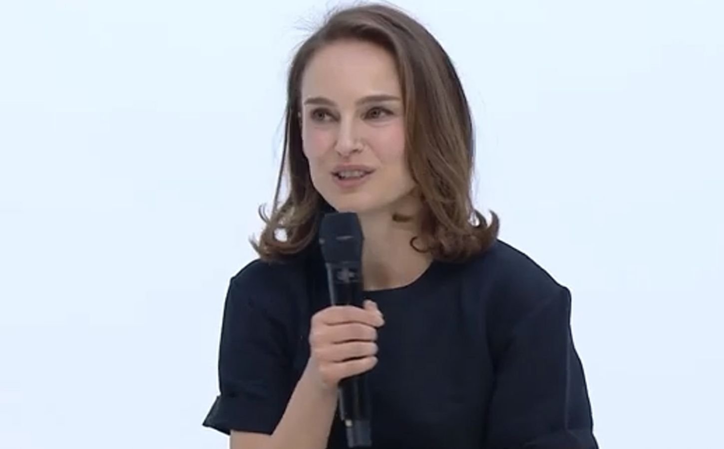 Photo shows Natalie Portman speaking during the closing ceremony of Change NOW's 2025 conference
