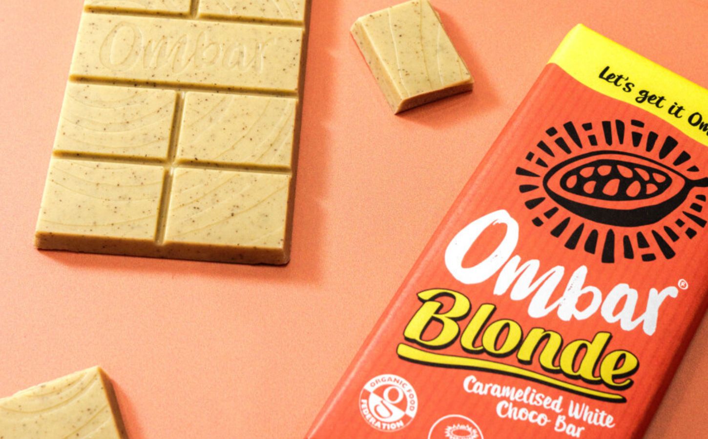 Photo shows the Ombar Blonde chocolate bar with it's packaging (right) and without (left)