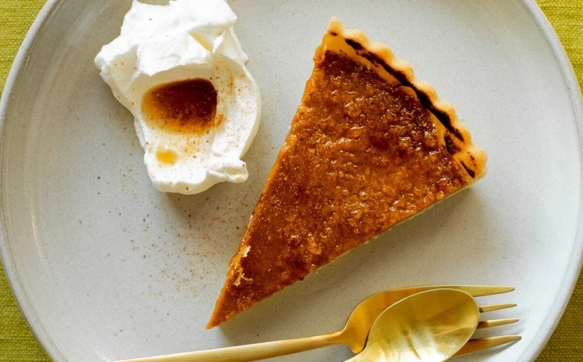 pumpkin and bourbon brulee tart with a maple syrup and bourbon sauce