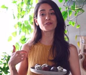 Sadia Badiei showing audience vegan snacks that help you sleep