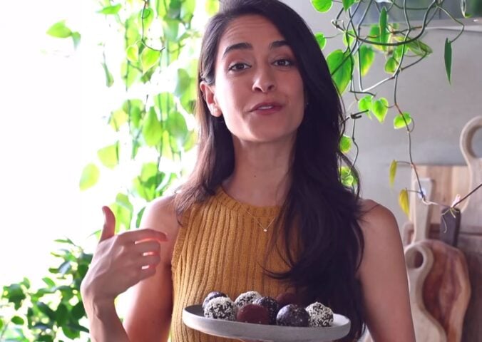 Sadia Badiei showing audience vegan snacks that help you sleep
