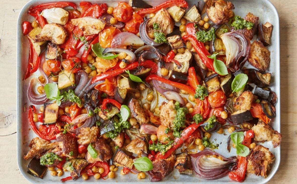 A tray of simple roasted summer veg with chickpeas and sourdough