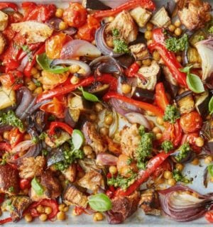 A tray of simple roasted summer veg with chickpeas and sourdough