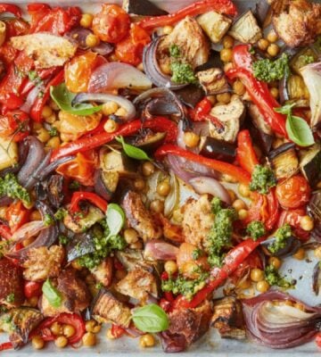 A tray of simple roasted summer veg with chickpeas and sourdough