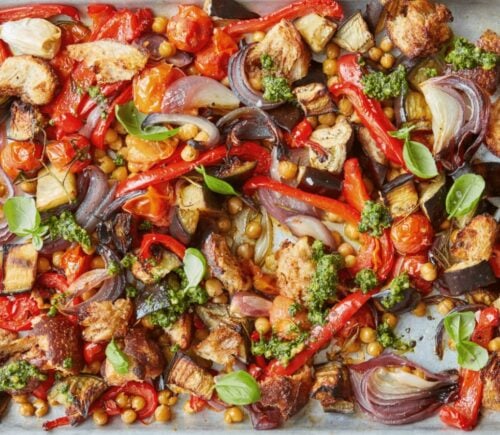 A tray of simple roasted summer veg with chickpeas and sourdough