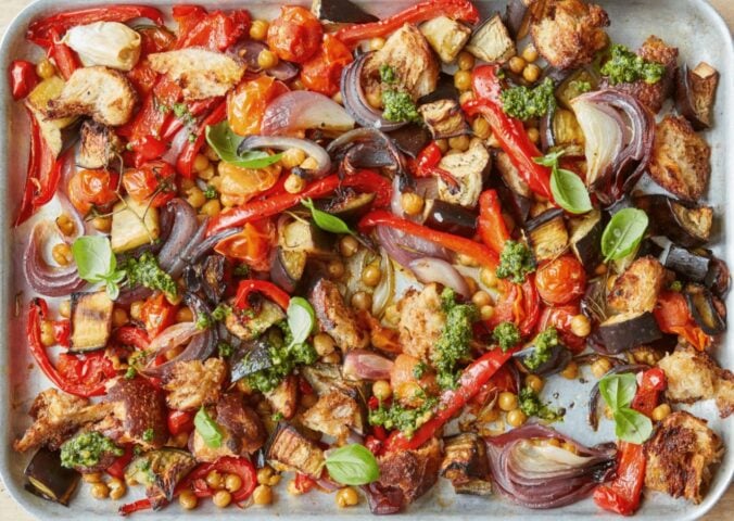 A tray of simple roasted summer veg with chickpeas and sourdough