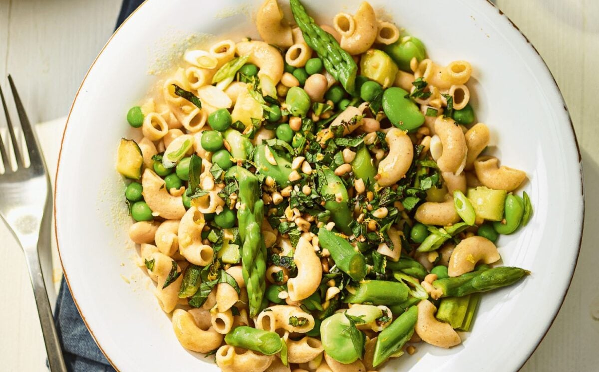 a summer veg and white bean pasta with edamame and asparagus