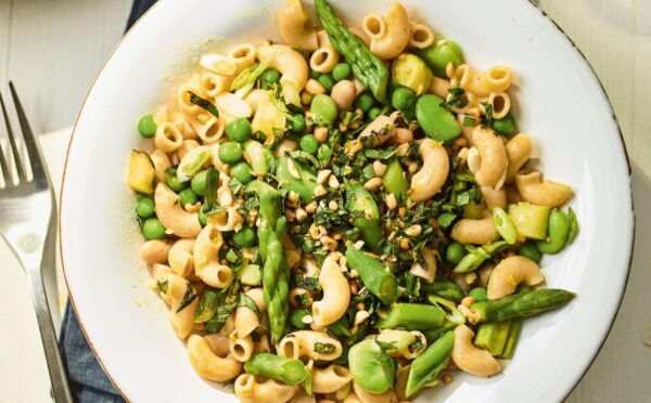 a summer veg and white bean pasta with edamame and asparagus
