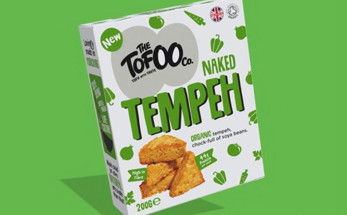 A packed of Tofoo Naked Tempeh in front of a green background