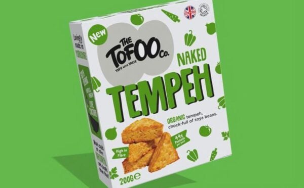 A packed of Tofoo Naked Tempeh in front of a green background
