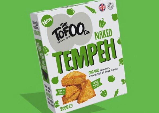 A packed of Tofoo Naked Tempeh in front of a green background