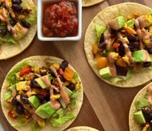 several tofu scramble tacos with soft shells