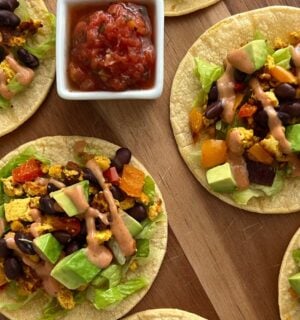 several tofu scramble tacos with soft shells