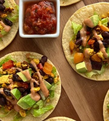 several tofu scramble tacos with soft shells