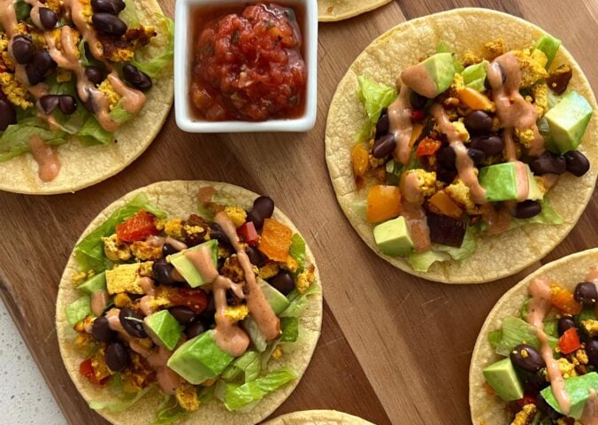 several tofu scramble tacos with soft shells