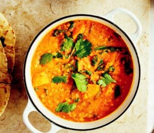 a tomato and coconut chickpea curry with flatbreads