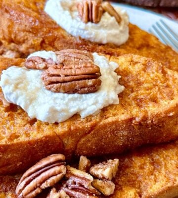 oven-baked French toast with pumpkin batter, coconut whipped cream, cinnamon and pecans for vegan brunch recipes