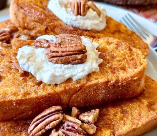 oven-baked French toast with pumpkin batter, coconut whipped cream, cinnamon and pecans for vegan brunch recipes