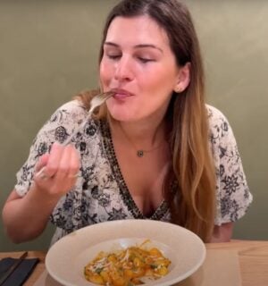 Nicole Whittle eating gnocchi at a fully vegan hotel in Rhodes, Greece