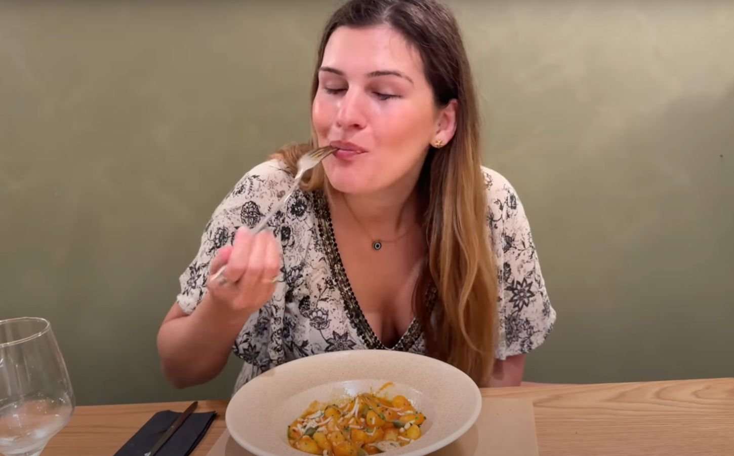 Nicole Whittle eating gnocchi at a fully vegan hotel in Rhodes, Greece