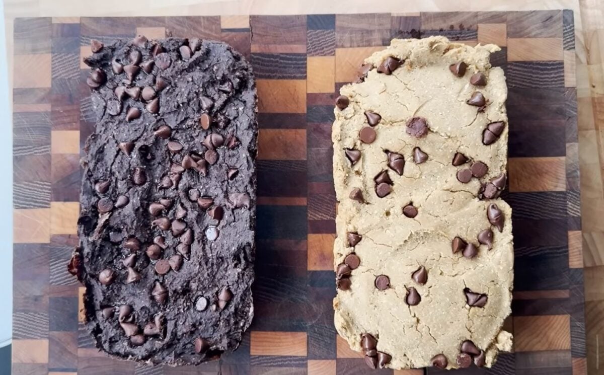 baked loafs of the viral chickpea protein bars, one with chocolate and black beans