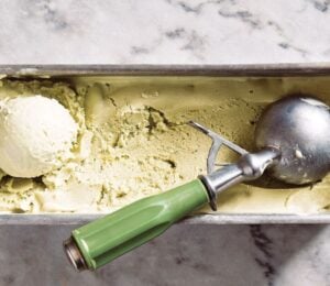 a tub of vegan avocado lime ice cream made with coconut milk