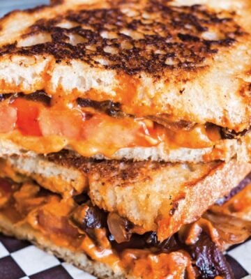 a vegan chipotle grilled cheese with caramelized onions made with cashew cheese