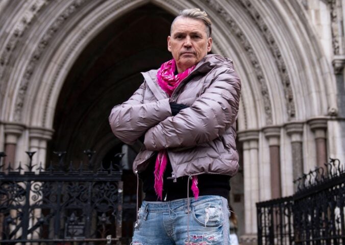 Photo shows Ecotricity founder Dale Vince outside of London's Royal Courts of Justice