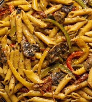 vegan grand rasta pasta with three colors of bell pepper