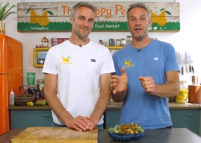The Happy Pear showing how to make the vegan kale caesar salad recipe