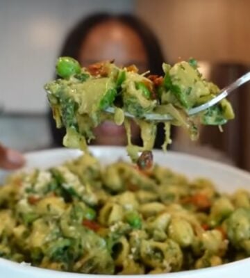Shakayla Felice eating an iron-rich vegan meal consisting of pesto pasta
