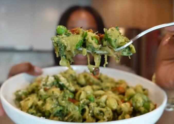 Shakayla Felice eating an iron-rich vegan meal consisting of pesto pasta