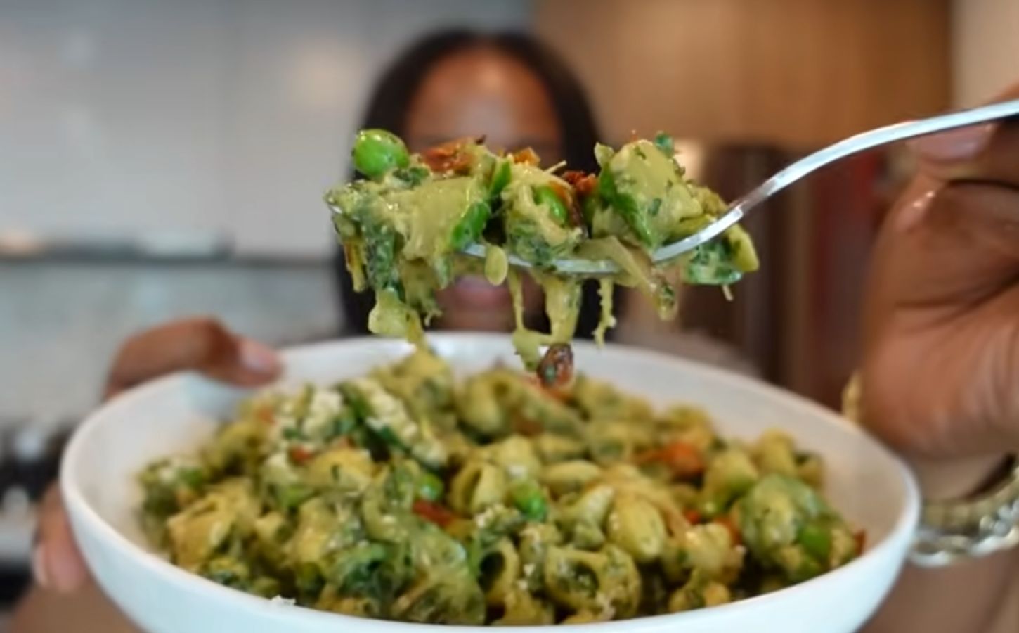 Shakayla Felice eating an iron-rich vegan meal consisting of pesto pasta