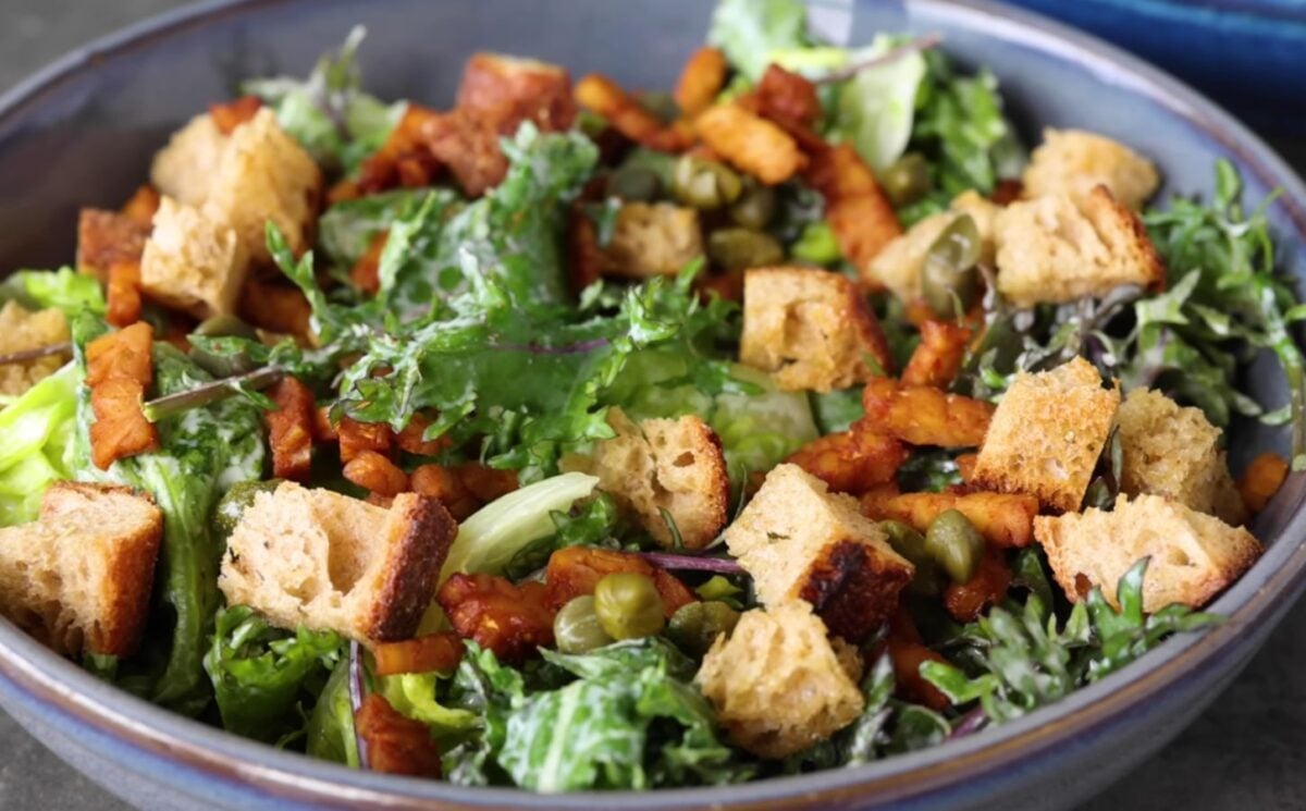 finished vegan kale caesar salad recipe with tempeh