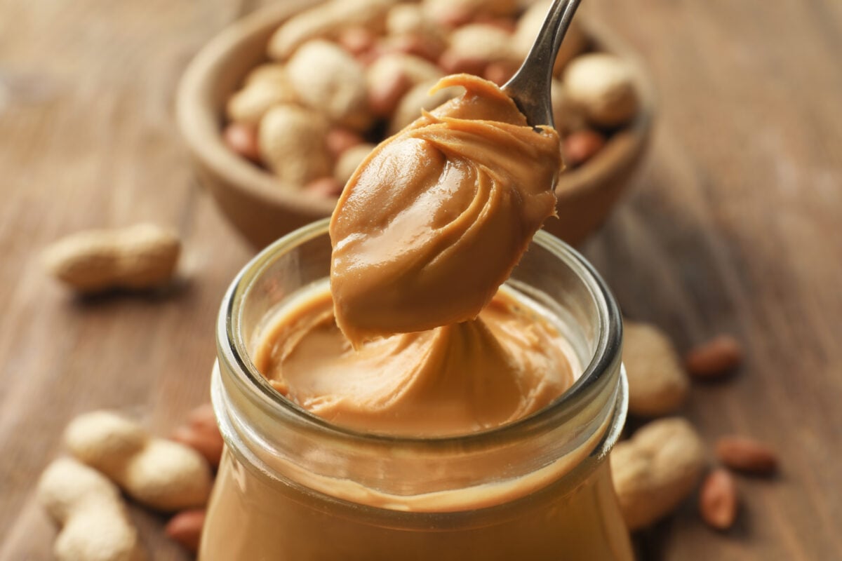 A jar of peanut butter, a healthy fat that should be limited to ease menopause symptoms