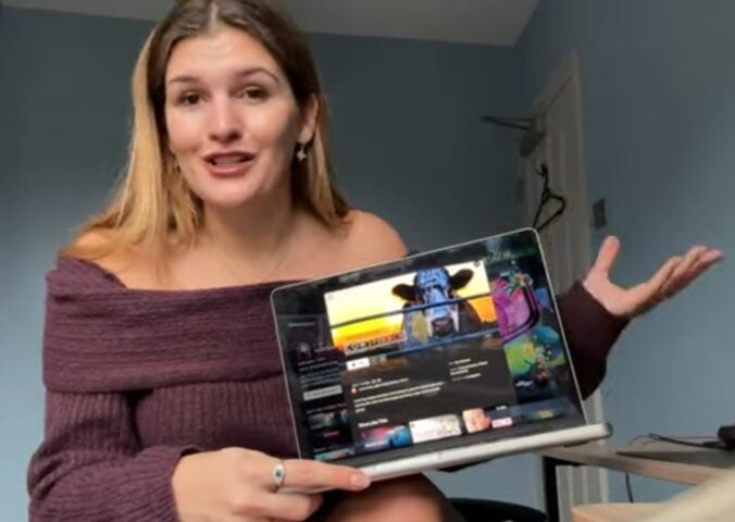 Nicole Whittle shares tips on how to go vegan overnight while showing her YouTube channel on a laptop screen.