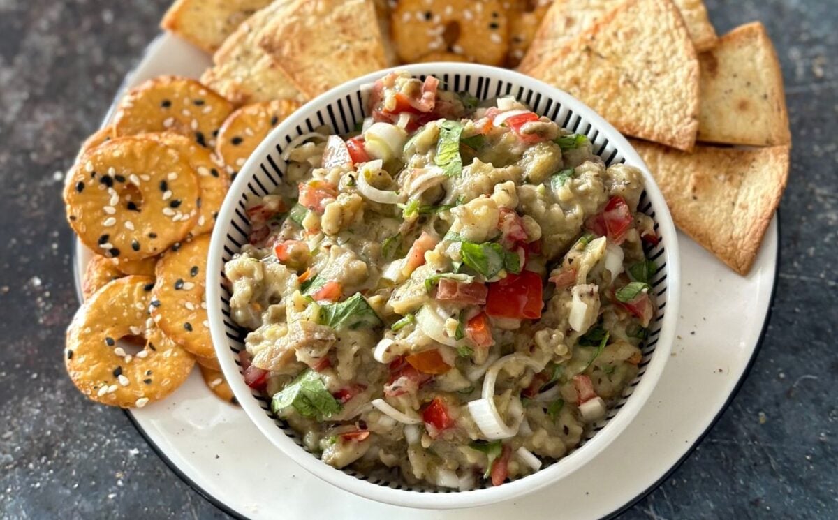 A roasted aubergine salad with some crackers