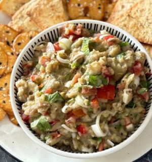 A roasted aubergine salad with some crackers