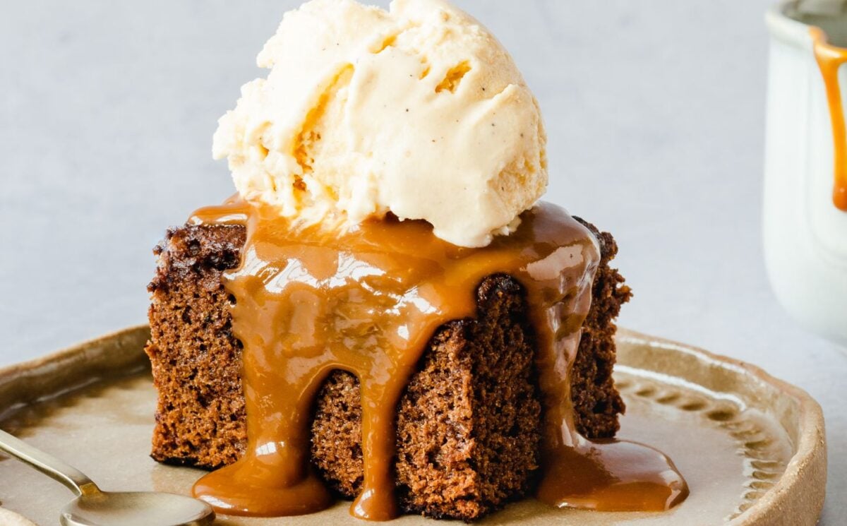 vegan sticky date cake with toffee and vanilla ice cream