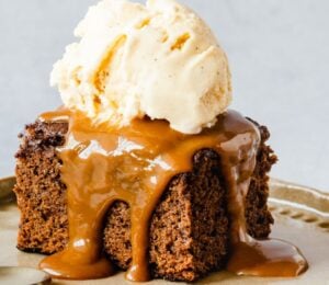 vegan sticky date cake with toffee and vanilla ice cream